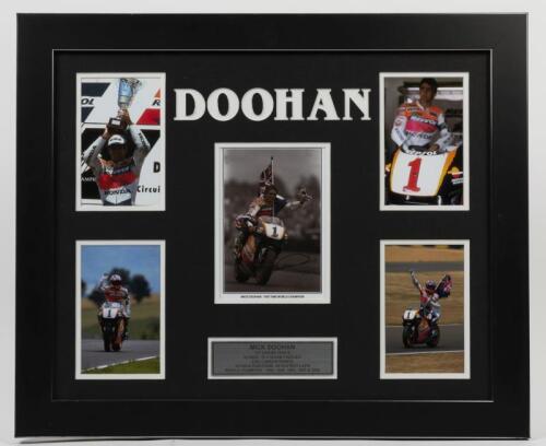 DOOHAN: A signed decorative framed collage featuring Mick Doohan&nbsp;with centre photo signed, with presentation metal plaque outlining career highlights, mounted framed and glazed, overall measurements 48cm high x 58cm wide
