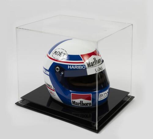 ALAIN PROST: A full sized replica racing helmet in Marlboro livery as worn by Alain Prost in his 1984 McLaren F1, in perspex case