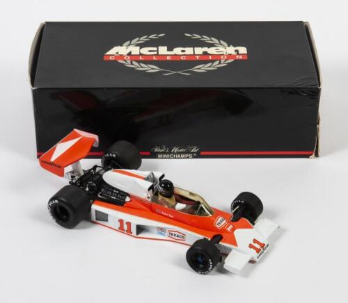 MCLAREN: A 1:18 scale Minichamps F1 McLaren Ford M23 as raced by James Hunt in 1976, #11, in fitted box