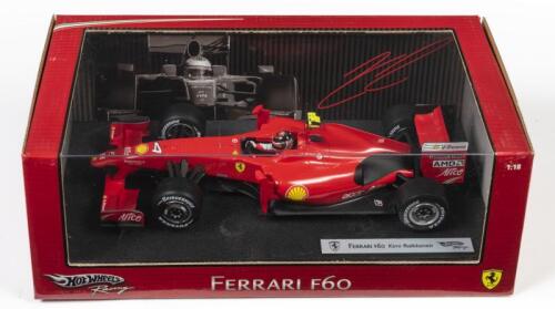 FERRARI: A 1:18 scale Hot Wheels F1 Ferrari F60 as raced by Kimi Raikkonen in 2009, Sponsored by Alice, AMD, Bridgestone, Shell, Acer, Fiat, and more, #4, in fitted box