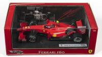 FERRARI: A 1:18 scale Hot Wheels F1 Ferrari F60 as raced by Kimi Raikkonen in 2009, Sponsored by Alice, AMD, Bridgestone, Shell, Acer, Fiat, and more, #4, in fitted box