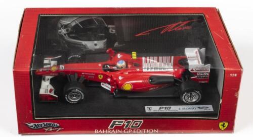 FERRARI: A 1:18 scale Hot Wheels F1 Ferrari F10 as raced by F. Fernando Alonso in 2010, #8, Bahrain GP edition, Sponsored by Bridgestone, Shell, acer, Fiat, Santander, AMD, Etihad Airways, and more, in fitted box