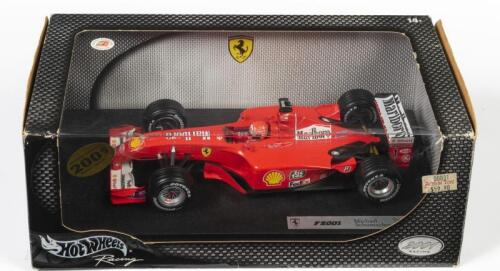 FERRARI: A 1:18 scale Hot Wheels F1 Ferrari F2001 as raced by Michael Schumacher, Sponsored by Marlboro, Tic tac, FedEx, Bridgestone, Shell, and more, #1, in fitted box