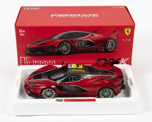 FERRARI: A 1:18 scale Bburago F1 Ferrari FXXK, #88, with additional stickers on the top of the car, opening: hood, doors and back engine bay, in fitted box