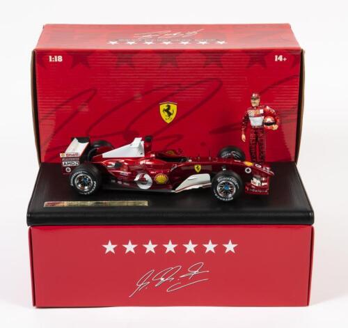 FERRARI: A limited edition 1:18 scale Hot Wheels F1 Ferrari 2004 as raced by Michael Schumacher, seven time world champion 1994, 1995, 2000, 2001, 2002, 2003, 2004, #1, figure Schumacher included, in fitted box