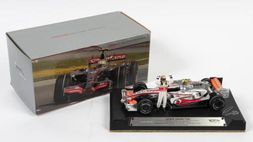 MCLAREN: A limited edition 1:18 scale Hot Wheels F1 McLaren MP4-ZZ as raced by Lewis Hamilton in 2007 Canadian Gran Prix winner, #2, Figure included, in fitted box