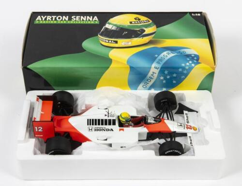 MCLAREN: A 1:18 scale Ayrton Senna F1 McLaren Honda MP 4/4, 1988, #12, in fitted box