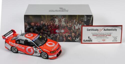FALCON: A limited edition 1:18 scale Classic Carlectables Ford Falcon BF as raced by Craig Lowndes/Jamie Whincup in 2007 Supercheap Auto Bathurst 1000 winner, Team Vodafone, with COA numbered 3545/9000, replica trophy included inside, in double fitted box