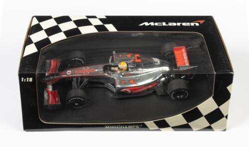 MCLAREN: A 1:18 scale Minichamps F1 McLaren Mercedes MP4-24 as raced by Lewis Hamilton in 2009, #1, Team Vodafone, in fitted box