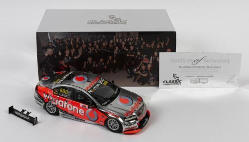 COMMODORE: A limited edition 1:18 scale Classic Carlectables Holden VE Commodore as raced by Craig Lowndes/Mark Skaife in 2010 Supercheap Auto Bathurst 1000 winner, Team Vodafone, with COA numbered310/5000, replica trophy included inside, in double fitted
