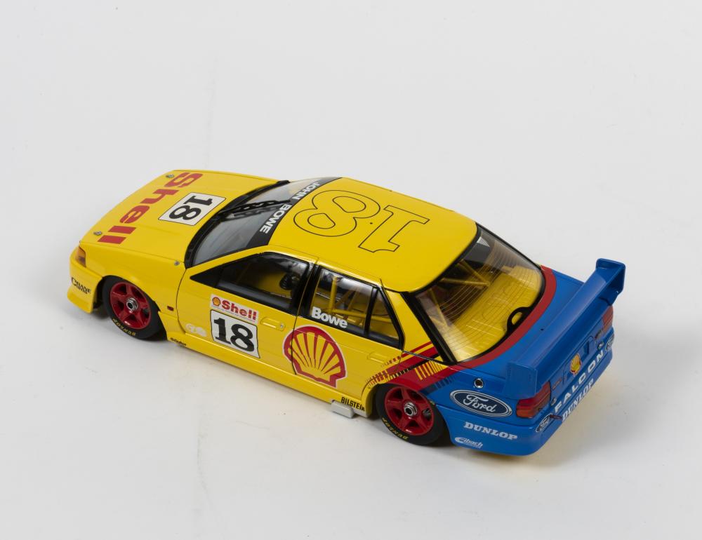 FALCON: A limited edition 1:18 scale Biante Ford EB Falcon as raced by  J.ohn Bowe in 1993 ATCC round one winner, #18, with COA numbered 241/700  signed by Bowe, missing the aerial,