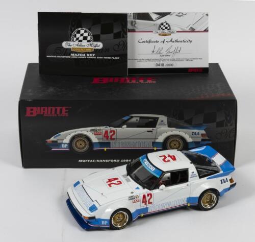 RX7: A limited edition 1:18 scale Biante Mazda RX7 as raced by Allan Moffat/Handsford in 1984 James Hardie 1000 third place, #42, with COA numbered 418/2000 signed by Moffat, in fitted box