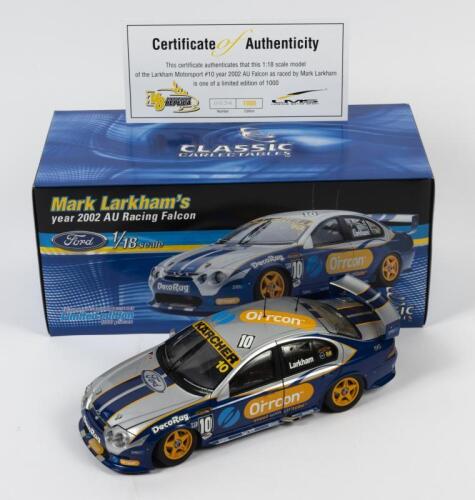 FALCON: A limited edition 1:18 scale Classic Carlectables Ford Falcon as raced by Mark Larkham in 2002 AU racing falcon, #10, with COA numbered 634/1000, in double fitted box