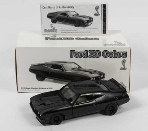COBRA: A limited edition 1:18 scale Classic Carlectables Ford XC Cobra, matt black, with COA numbered 133/720, in double fitted box