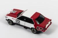 TORANA: A 1:18 scale Autoart Holden LX Torana A9X Sedan as raced by Peter Brock in 1978 at Sandown, with COA numbered 1102/1700, #5, aerial detached but present, in fitted box, box faded - 2