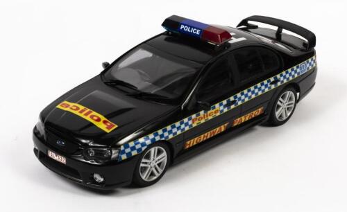 FALCON: A limited edition 1:18 scale Biante Ford FGX Falcon V8 Supercar, with satin black diecast model in later Victorian Police livery, aerial detached, no box