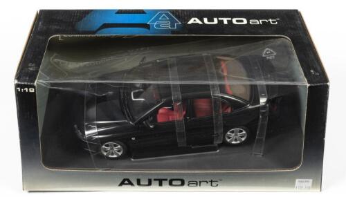 COMMODORE: A 1:18 scale Autoart Holden VY Commodore SS, black, in fitted box, box damage on the top