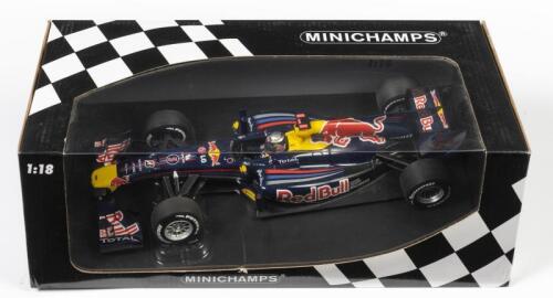 RENAULT: A 1:18 scale Minichamps F1 Renault RB6 as raced by Sebastian Vettel in 2010, #5, Red Bull Racing team, in fitted box