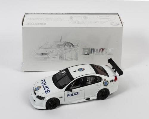 COMMODORE: A 1:18 scale Biante Holden Commodore VE II - exclusive limited edition white diecast model in later Victorian Police livery, with COA numbered 266/750,&nbsp;aerial detached but present, in fitted box, tape on box