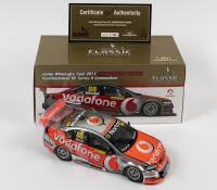 COMMODORE: A limited edition 1:18 scale Classic Carlectables Holden VE Series II Commodore as raced by Jamie Whincup in 2011 Championship winner, #88, Team Vodafone, with COA numbered 321/750, in double fitted box