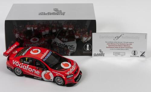 COMMODORE: A limited edition 1:18 scale Classic Carlectables Holden VE Series II Commodore as raced by Jamie Whincup/Paul Dumbrell in 2012 Super auto Bathurst 1000 winner, Team Vodafone, with COA numbered 772/2675, replica trophy included inside, in doubl