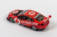 COMMODORE: A limited edition 1:18 scale Classic Carlectables Holden VE Series II Commodore as raced by Jamie Whincup/Paul Dumbrell in 2012 Super auto Bathurst 1000 winner, Team Vodafone, with COA numbered 772/2675, replica trophy included inside, in doubl - 2