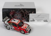 COMMODORE: A limited edition 1:18 scale Classic Carlectables Holden VE Commodore as raced by Garth Tander/ Will Davisons in 2009, with COA numbered 2786/5300, replica trophy included inside, in double fitted box