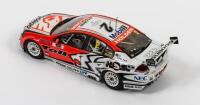 COMMODORE: A limited edition 1:18 scale Classic Carlectables Holden VE Commodore as raced by Garth Tander/ Will Davisons in 2009, with COA numbered 2786/5300, replica trophy included inside, in double fitted box - 2