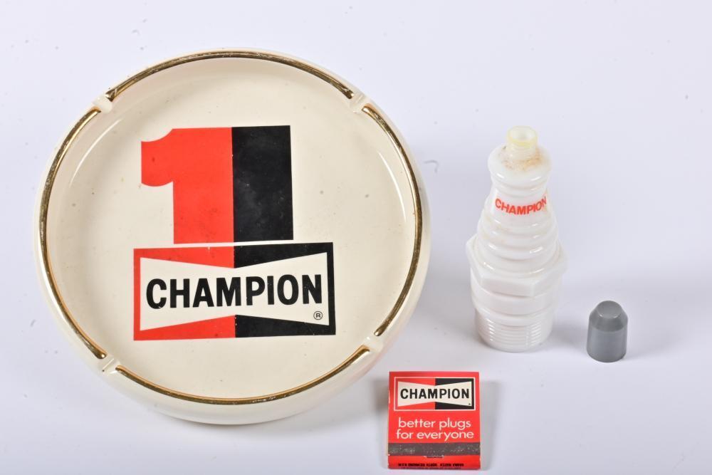 CHAMPION: A spark plug form white glass aftershave bottle CHAMPION: A spark plug form white glass aftershave bottle