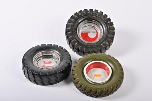 NOVELTY ASHTRAYS:Three novelty tyre form promotional ashtrays, including Bridgestone