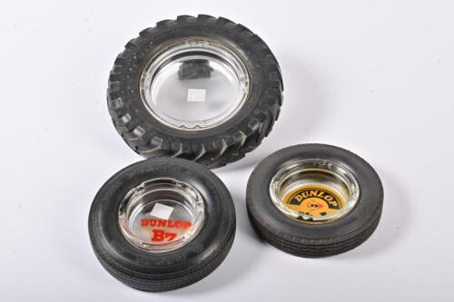 DUNLOP: Three novelty tyre form Dunlop rubber and glass promotional ashtrays, including a large tractor tyre the largest 19.5cm diameter