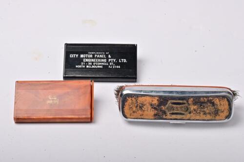 GOLDEN FLEECE: A vintage Golden Fleece clothes brush and a two travel clothes brushes, valet not included