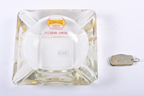 GOLDEN FLEECE: A rare glass Golden Fleece ashtray with the 1940s logo and a Golden Fleece pocket knife/bottle opener, the ashtray with chips to each corner