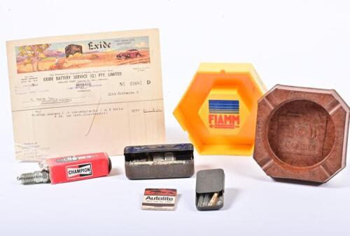 SPARK PLUGS/BATTERIES: A collection of spark plug and battery related items, including a Bakelite Century ashtray, Champion spark plug etc