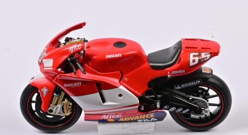 DUCATI: A 1:12 scale Ducati Demosedici #65 Loris Capirossi 2004, missing the visor, no box