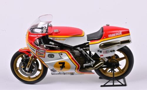 SUZUKI: A 1:12 scale Suzuki RG 500 GP 1977 Barry Sheene #7 WORLD CHAMPIONSHIP WINNING BIKE, slight paint damage shown in the photo, with the stand, no box