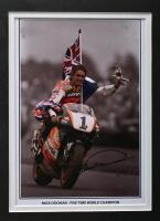 DOOHAN: A signed decorative framed collage featuring Mick Doohan&nbsp;with centre photo signed, with presentation metal plaque outlining career highlights, mounted framed and glazed, overall measurements 48cm high x 58cm wide - 2