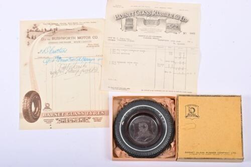 BARNET GLASS TYRES: A Bakelite and rubber ashtray, NOS and NIB, with associated paperwork, the ashtray 13.5cm diameter