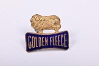 GOLDEN FLEECE: A circa 1950's Golden Fleece driveway attendants enameled cap badge, lacking clasp, 3.5cm high, 4cm deep