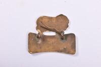 GOLDEN FLEECE: A circa 1950's Golden Fleece driveway attendants enameled cap badge, lacking clasp, 3.5cm high, 4cm deep - 2