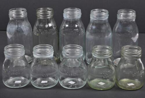 OIL BOTTLES: A collection of ten metric glass oil bottles, five one litre bottles, five five hundred milliliters