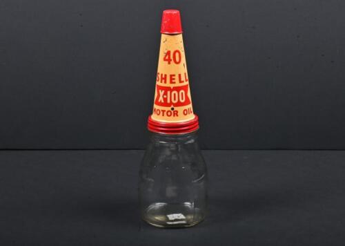 SHELL: A one pint glass oil bottle with NOS Shell 40 tin oil pourer and dust cap