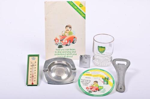 BP: A collection of BP items including a bottle opener and gilt rim glass