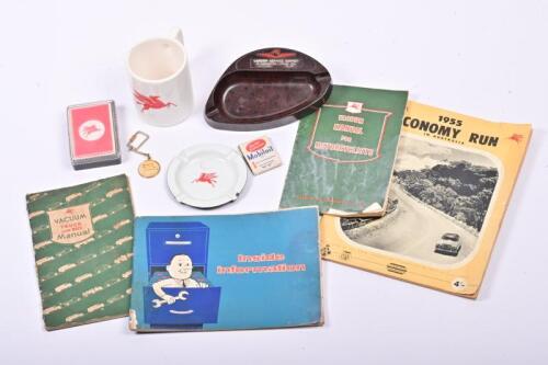 VACUUM OIL CO: A collection of Vacuum Oil co items and ephemera including motorcycle, truck and bus manuals, ashtrays, mug and more