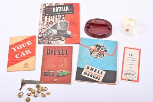 SHELL: A collection of Shell ephemera and items, including a Bakelite ashtray, a key ring, uniform buttons, lubrication guides etc