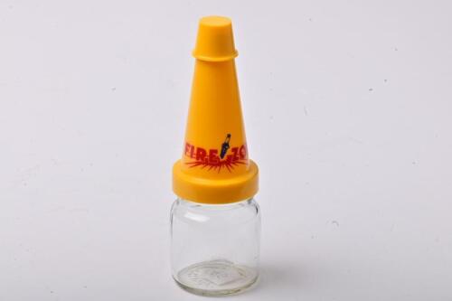 FIREZONE: A small NOS Firezone oil bottle with plastic pourer and cap