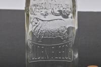 GOLDEN FLEECE: An embossed ram one imperial quart Golden Fleece glass oil bottle with NOS Golden Fleece 30 grade tin pourer and dust cap - 2