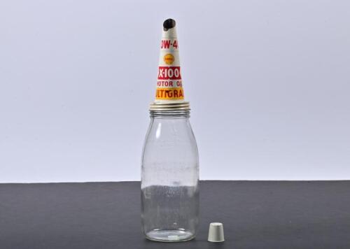 SHELL: A 1960s one quart glass oil bottle with NOS 20W-40 X-100 tin oil pourer and dust cap