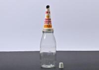 SHELL: A 1960s one quart glass oil bottle with NOS 20W-40 X-100 tin oil pourer and dust cap