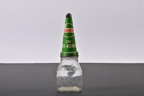 CASTROL WAKEFIELD: An one imperial pint glass oil bottle with a CW 30-40 MS Castrol Wakefield tin pourer